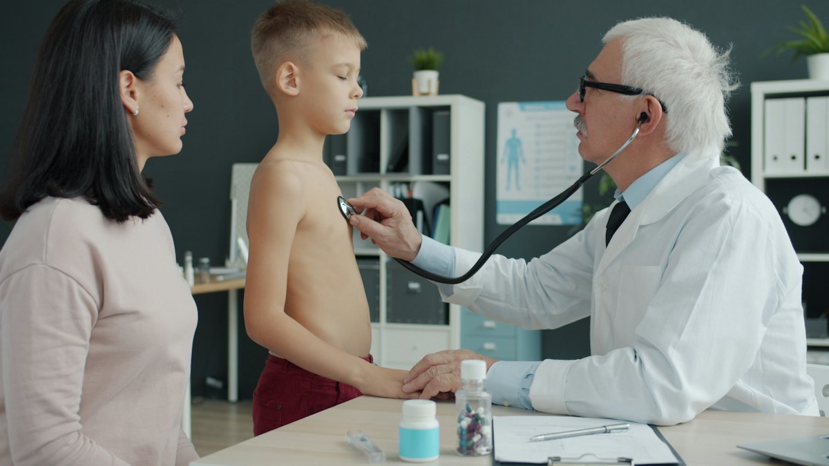 Doctor examining a child